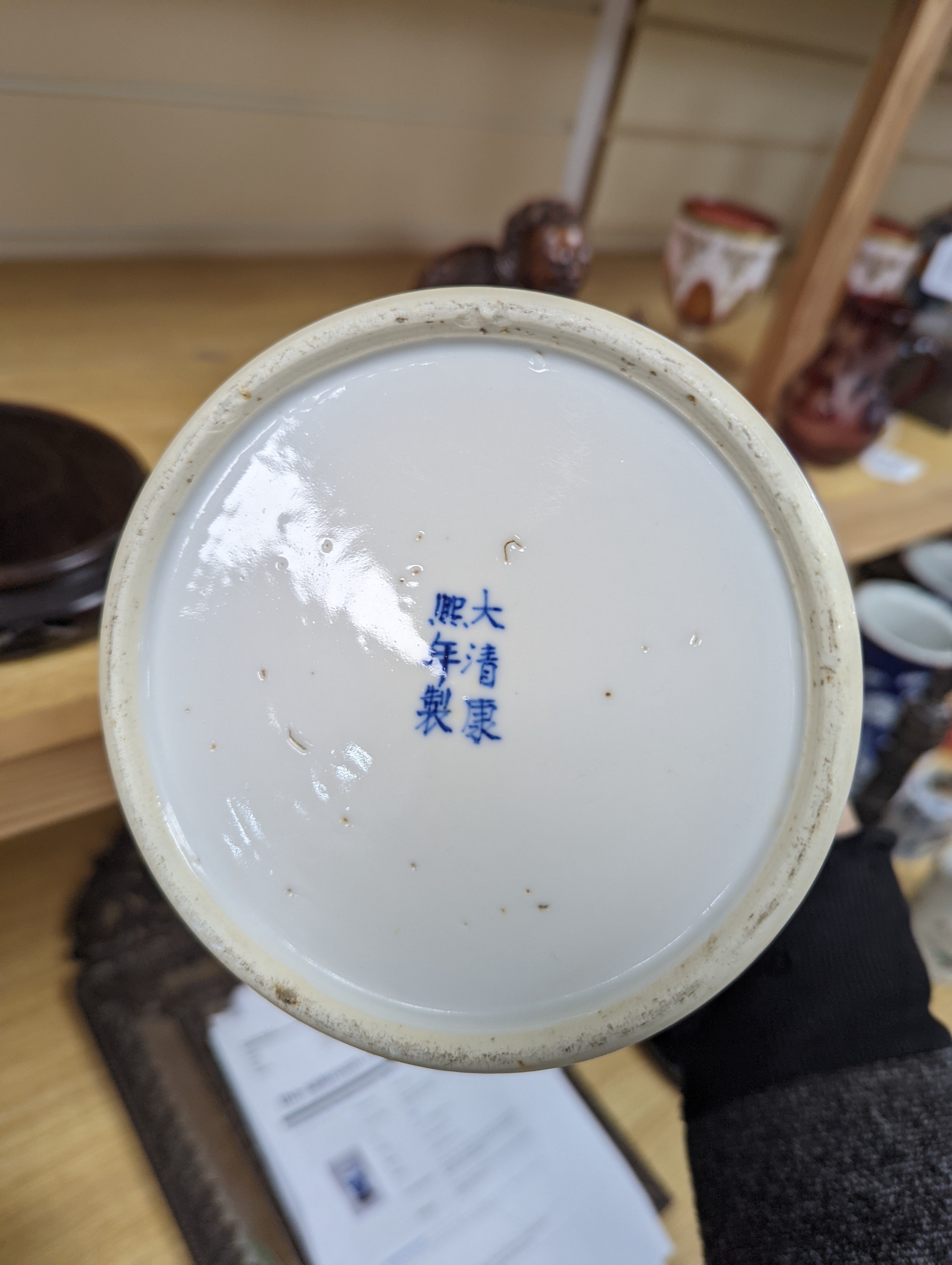 A late 19th / early 20th century Chinese blue and white landscape jar and cover, wood stand 30cm total height